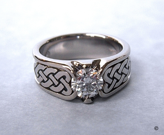 White Gold Celtic Heart Shield Ring flush set with a .75ct Diamond